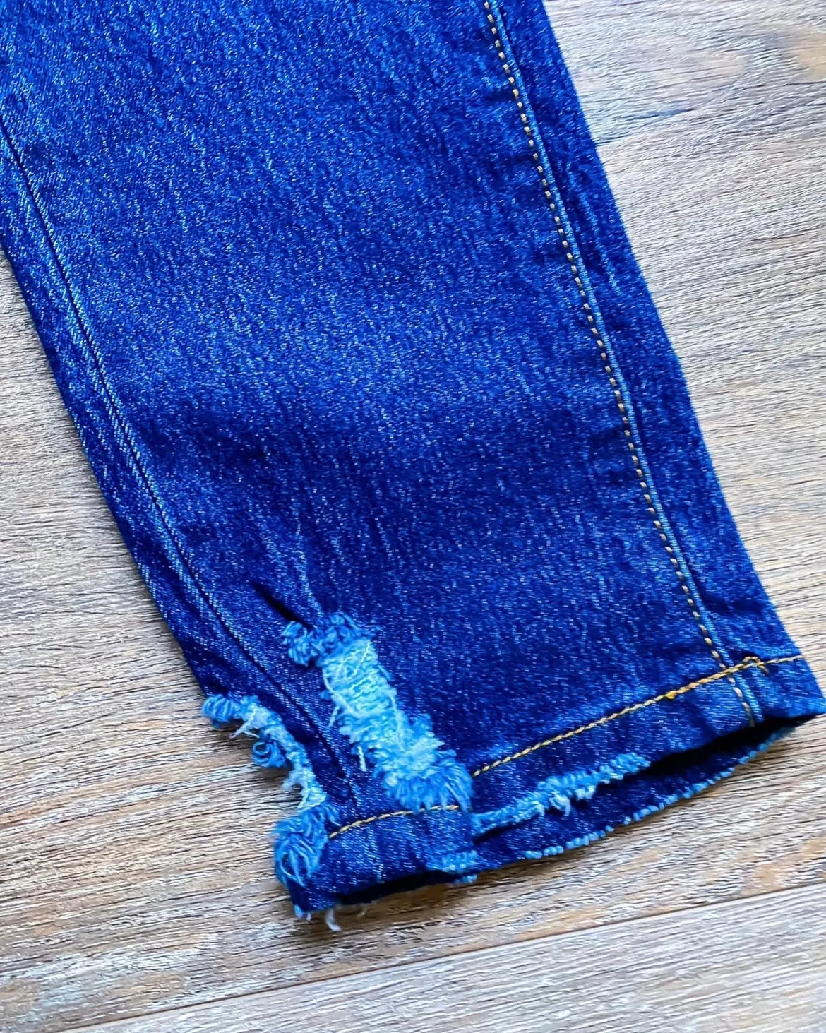 Dark Wash Tapered Denim Jeans with Distressed Ankle